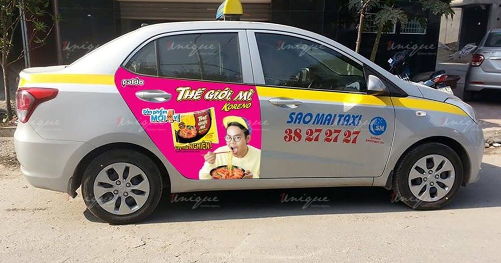 quảng cáo trên taxi Sao Mai