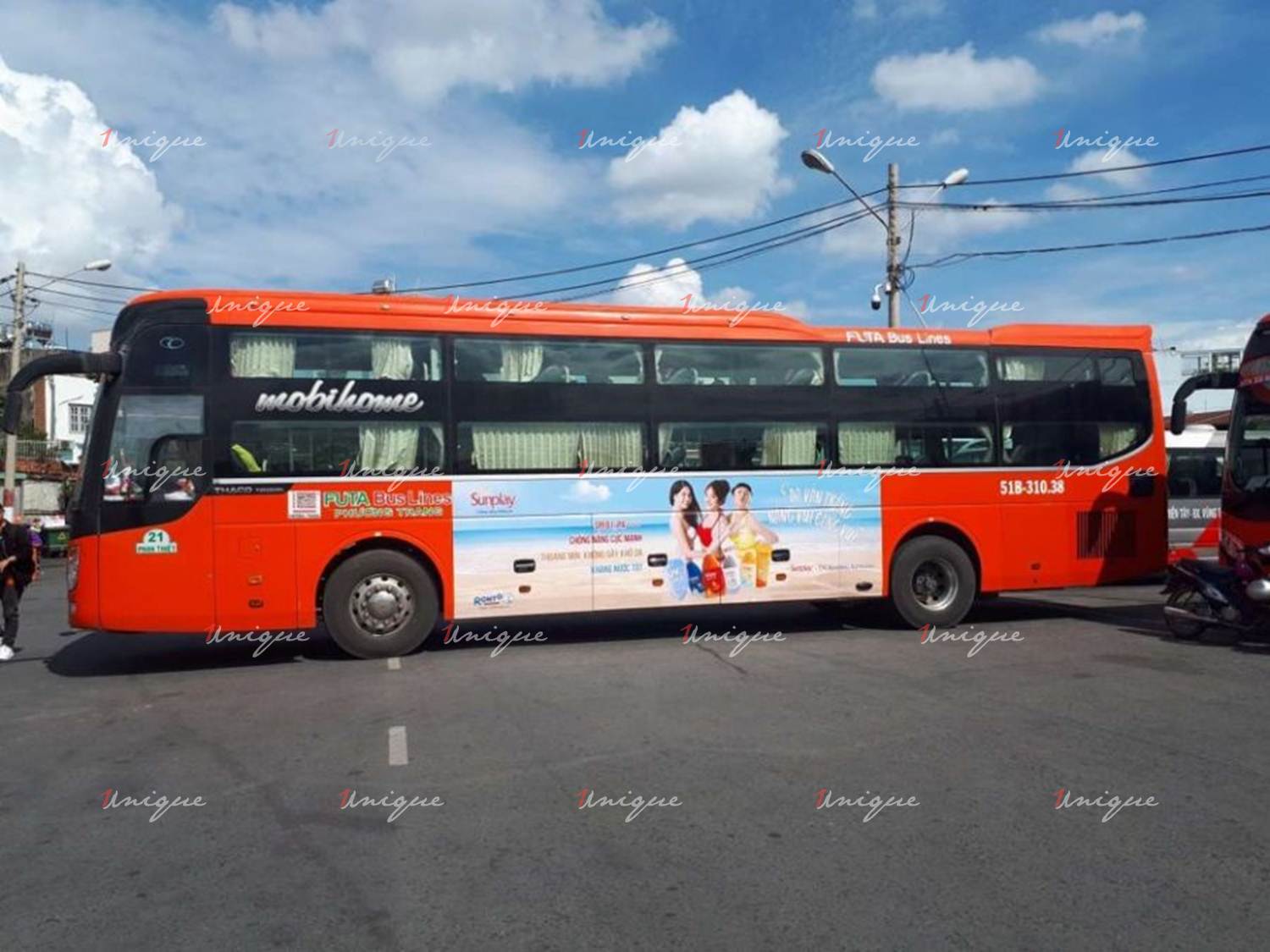 quảng cáo trên xe khách