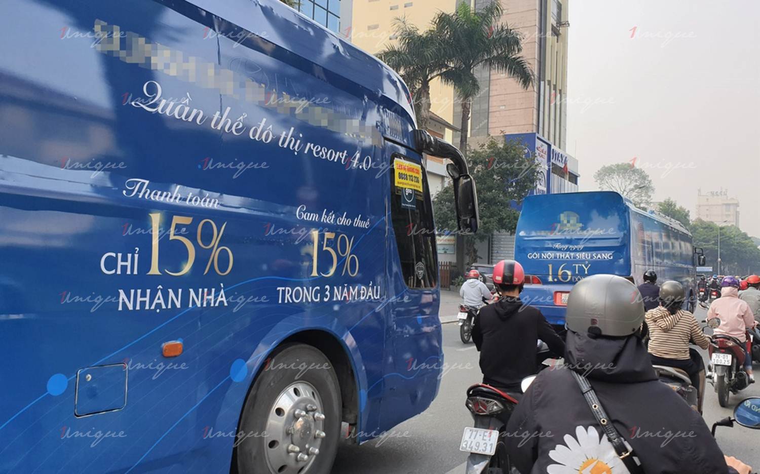 quảng cáo trên xe khách