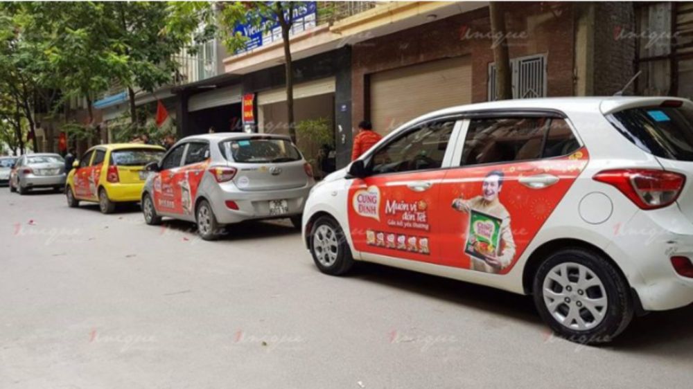 Mì Cung Đình quảng cáo trên xe ô tô và taxi nhân dịp Tết Nguyên Đán Mì Cung Đình quảng cáo trên xe ô tô và taxi nhân dịp Tết Nguyên Đán